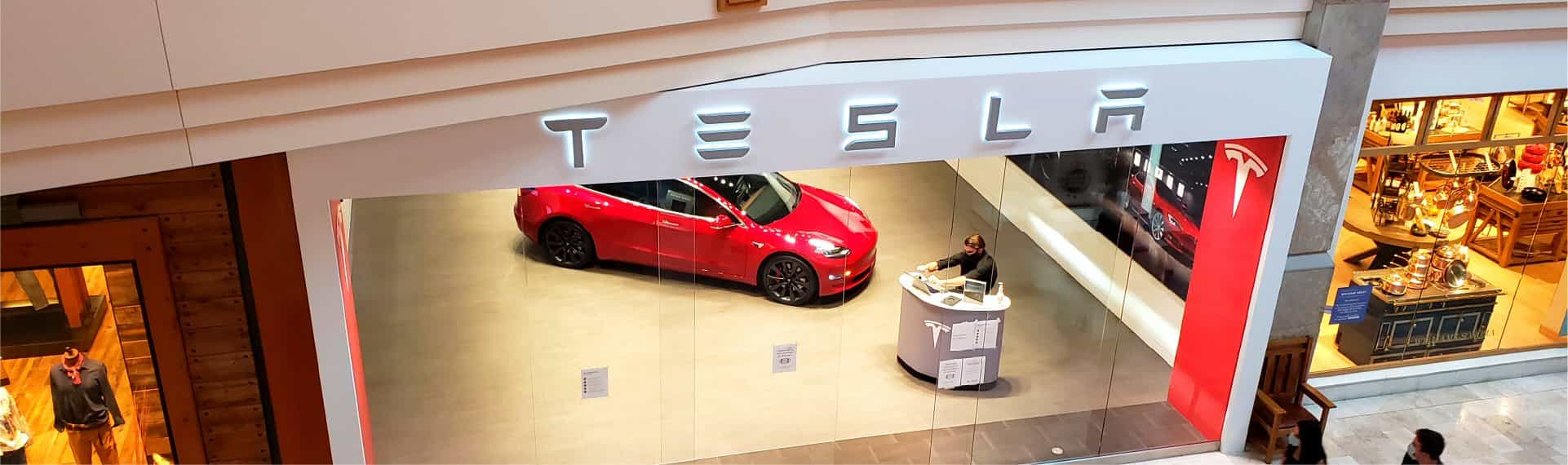 overhead view of the exterior of a Tesla showroom